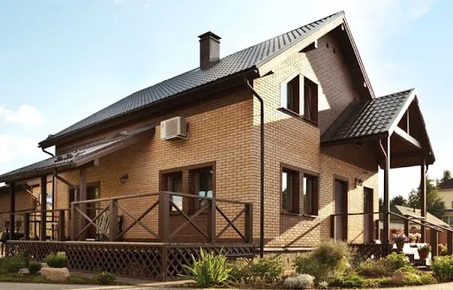 Красивые двухэтажные дома из разного кирпича (100 фото)